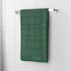 Vannitoa rätik „Terry Green“. Rätikud, 50x90 cm, 70x140 cm. Elegantne tumeroheline puuvillane vannirätik, ühendab endas pluusse mugavuse ja suure imavuse, mis tagab esmaklassilise tunde pärast iga duši allkäiku.
